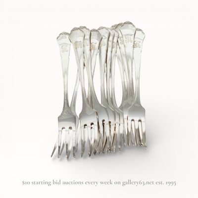 Sale Photo Thumbnail #160: A Set of Nine 830 Silver Three-Tine Forks with Shell Terminals, Late 19th-early 20th C.