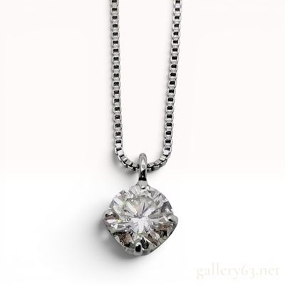 Sale Photo Thumbnail #408: Platinum and 0.212 Carat Round Brilliant-Cut Diamond Solitaire Pendant Necklace