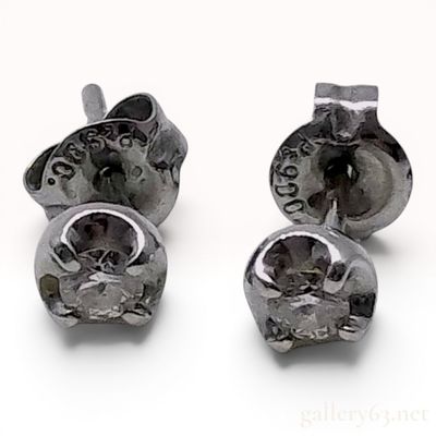 Sale Photo Thumbnail #415: A Pair of Platinum and Round-Cut Diamond Stud Earrings