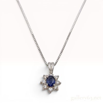 Sale Photo Thumbnail #272: Sapphire and Diamond Halo Pendant in Platinum on an 18K White Gold Box Chain