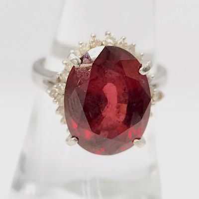 Sale Photo Thumbnail #112: Platinum, Garnet and Diamond Halo Cocktail Ring