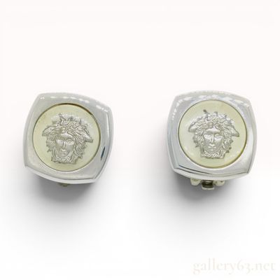 Sale Photo Thumbnail #443: A Pair of Vintage Gianni Versace Silver-Toned Medusa Clip-On Earrings