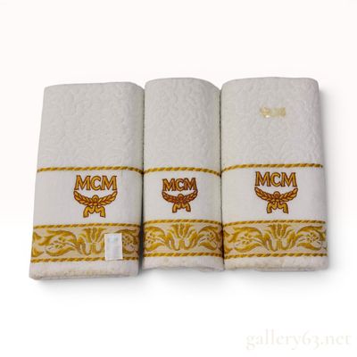 A Trio of MCM Branded Hand Towels