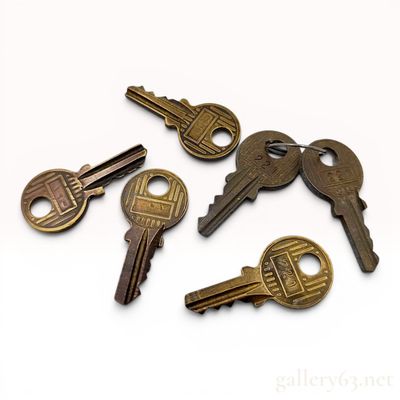 Sale Photo Thumbnail #478: A Collection of Vintage Gold-Tone Hermes Keys