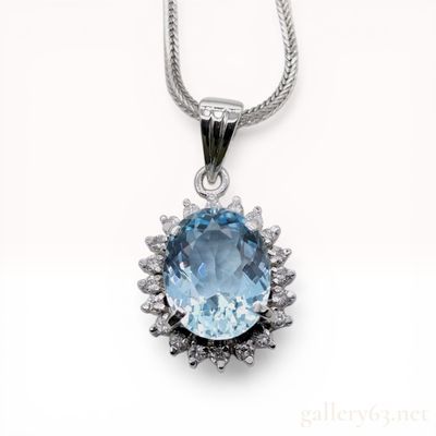 Sale Photo Thumbnail #475: Platinum Aquamarine and Diamond Halo Pendant Necklace