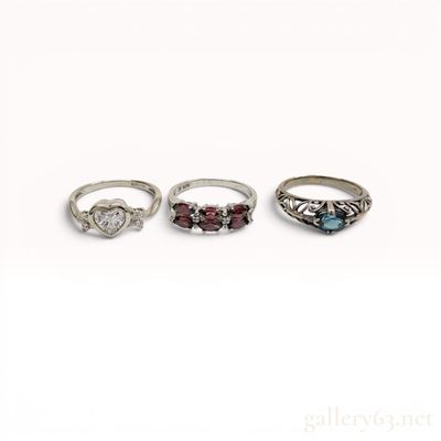 Sale Photo Thumbnail #129: A Trio of Sterling Silver and Gemstone Rings