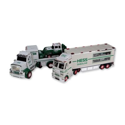 Sale Photo Thumbnail #271: Two Hess Toy Trucks with Tractor and Racecars Set