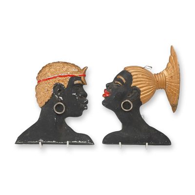 Sale Photo Thumbnail #219: Pair of Mid-Century Modern Painted Cast Aluminum Africana Wall Decorations