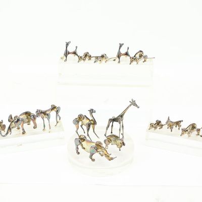 Sale Photo Thumbnail #45: Group of Mid-Century Modern Metal Animal Figurines