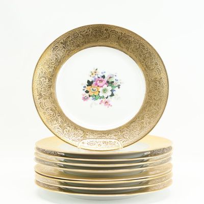 Sale Photo Thumbnail #151: Nine Hutschenreuther Floral Decorated and Gilt Rimmed Plates