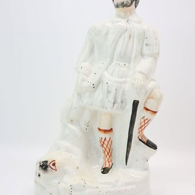 Sale Photo Thumbnail #141: Staffordshire Porcelain Figure of Highland "The Lion Slayer"