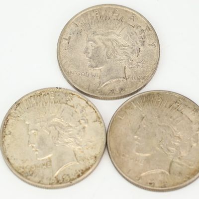Sale Photo Thumbnail #98: Three Silver Peace Dollar Coins