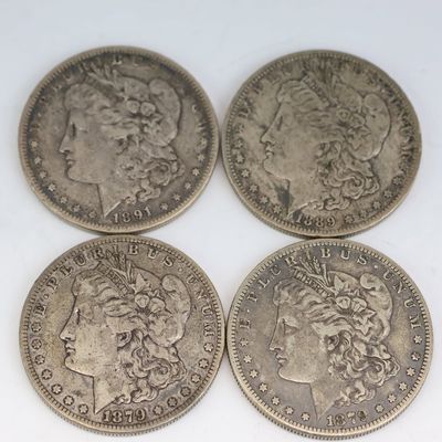 Sale Photo Thumbnail #101: Four 1800's Morgan Silver Dollars
