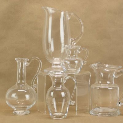 Sale Photo Thumbnail #162: Five Simon Pearce Glass Pitchers
