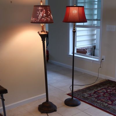 Two Decorative Floor Lamps with Red and Laser-Cut Peacock Shades