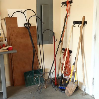 An Assortment of Yard Garden and Garage Organizational Equipment