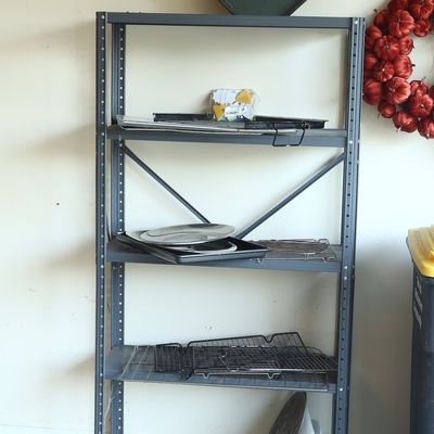 A Gray Steel Utility Shelving Unit with a Collection of Kitchenware and Vinyl Records
