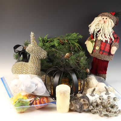 An Assortment of Seasonal and Holiday Decorations Including a Father Christmas Figure and Beaded Reindeer