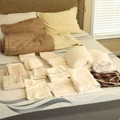 An Assortment of Bedding and Household Linens Including a Luxury Hotel Cotton Comforter
