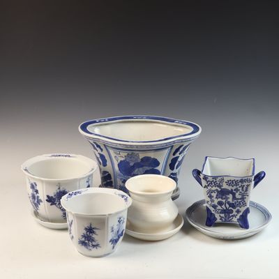 A Collection of Five Chinese Blue and White and Monochrome Glazed Ceramic Planters