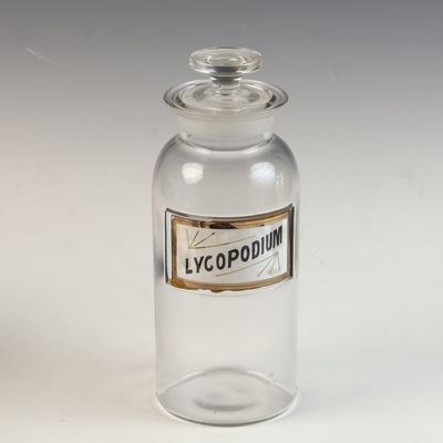 Antique Glass Apothecary Bottle with Reverse Painted Lycopodium Label