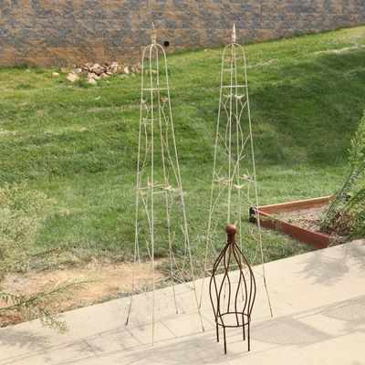 A Trio of Decorative Metal Garden Trellises and Plant Supports