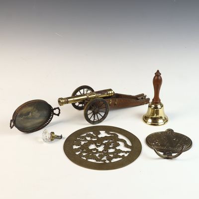 Collection of Brass and Glass Decorative Objects, Monogrammed Hook, and Model Field Cannon