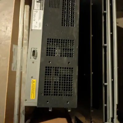 Sale Photo Thumbnail #103: Cisco rack-mountable network switch or server component, shown with mounting brackets inside a cardboard box.