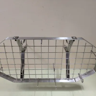 Sale Photo Thumbnail #122: Industrial-style stainless steel wire basket shelf with mounting brackets, showing some light wear.