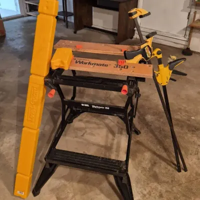 Black & Decker 350 Portable Work Bench, Johnson 48” Contractor’s Level, Bar Clamps