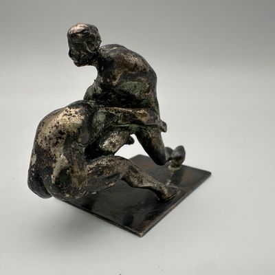 Figural Metal Sculpture of Two Intertwined Figures