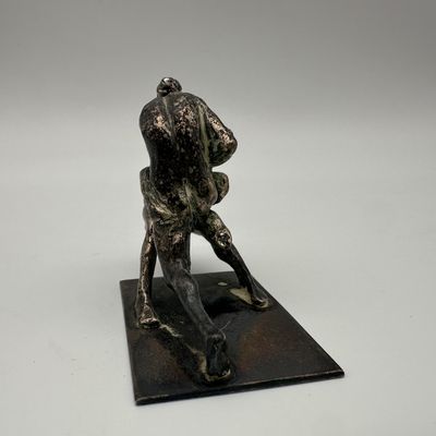 Figural Metal Sculpture of Two Intertwined Figures