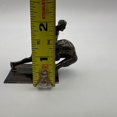 Figural Metal Sculpture of Two Intertwined Figures