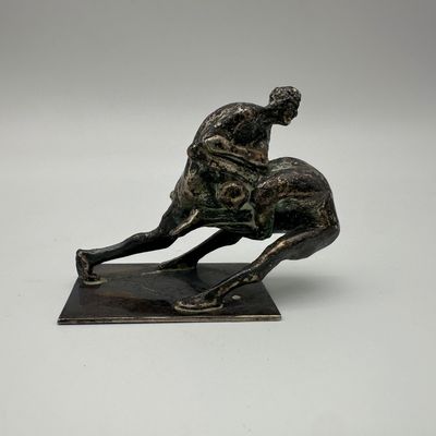 Figural Metal Sculpture of Two Intertwined Figures