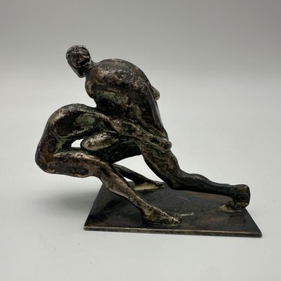 Figural Metal Sculpture of Two Intertwined Figures