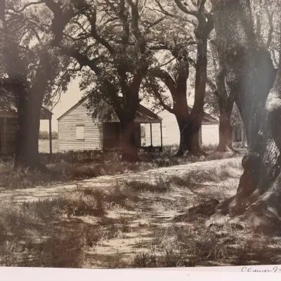 Clarence John Laughlin (1905–1985), “Two Homes Along Country Roads with Trees,” Signed Gelatin Silver Photograph