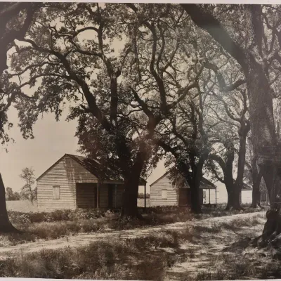 Clarence John Laughlin (1905–1985), “Two Homes Along Country Roads with Trees,” Signed Gelatin Silver Photograph
