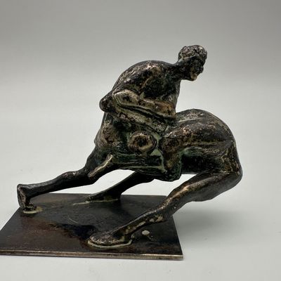 Figural Metal Sculpture of Two Intertwined Figures