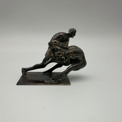 Figural Metal Sculpture of Two Intertwined Figures