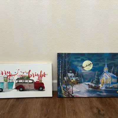 Pair of Christmas Wall Art – “Merry & Bright” Camper & Santa Sleigh Church Scene