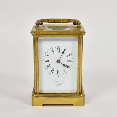 Sale Photo Thumbnail #369: Howell & James Gilt Brass Corniche Carriage Clock