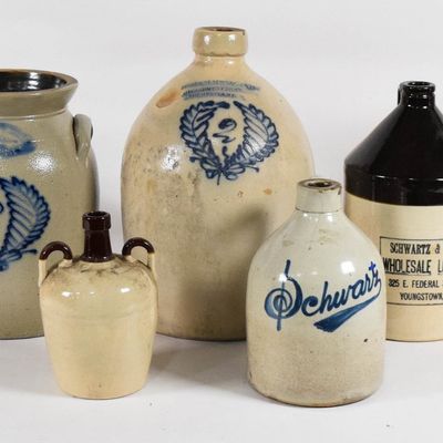 Sale Photo Thumbnail #245: 7 American Salt-Glazed and Stenciled Stoneware Advertising Jugs and Crock