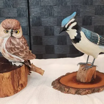 Hand Carved Owl and Blue Jay on Natural Wood Stands