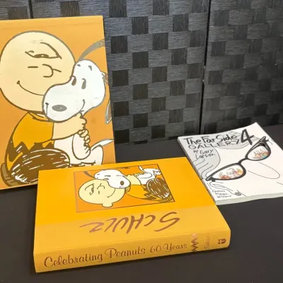 Peanuts 60 Year Anniversary Book plus Far Side 4 