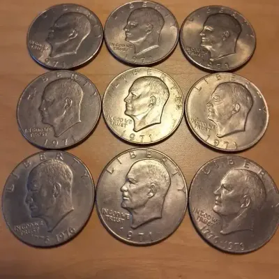 Eisenhower “Ike” Dollar Coin Collection – 9 Coins, 1971–1976