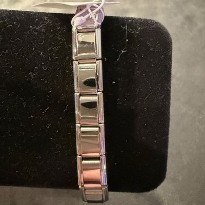shiny stainless steel Italian charm starter bracelet featuring blank modular links.