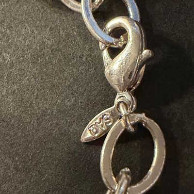 SAQ marked turquoise charm piece bracelet