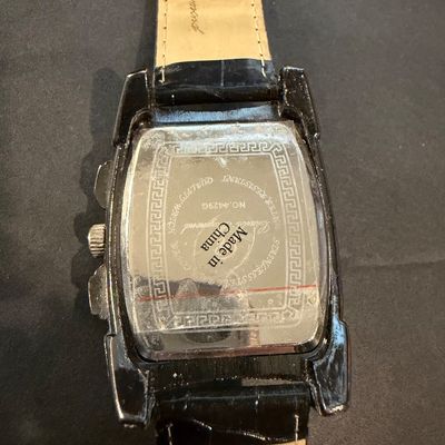 Charles Raymond quartz wristwatch with a black leather strap