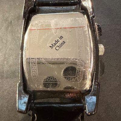Charles Raymond quartz wristwatch with a black leather strap