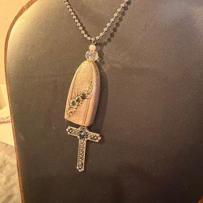 Vintage silver tone cross with blue rhinestone necklace
